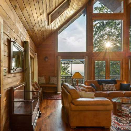 Sun streams into the majestic great room, boasting cathedral ceilings and a wall of West facing windows. Drink in every last second of sunset!