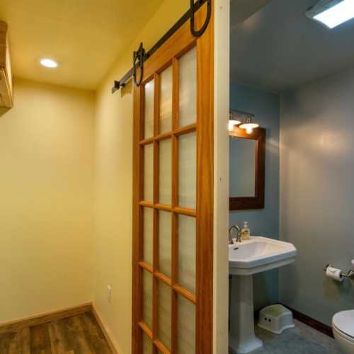 Bathroom #3: full bathroom on lower level with a shower