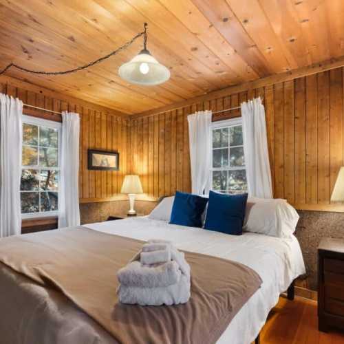 Bedroom #1: King bed on the main floor; note that bedroom 1 and 2 are only separated by sliding doors