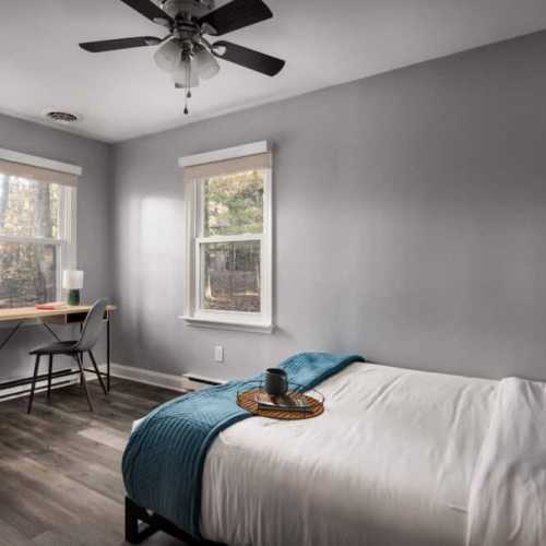 Queen Bed and work from home with your forest views.