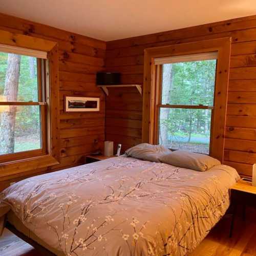 Bedroom #1: queen bed on main floor with en suite full bathroom