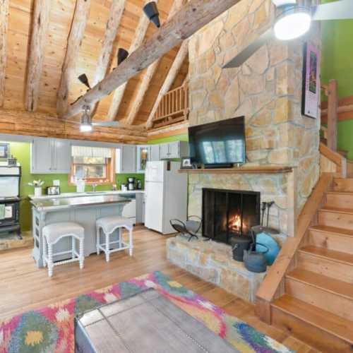 The antique kitchen oven/stovetop in this photo has been replaced with a brand-new and much more functional induction stovetop and oven.