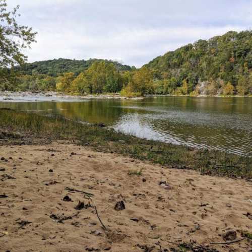This secluded beach below the rapids is just down the hill and through the woods--a 10-15 minute walk from the house. The beach itself is state park land that borders the property.